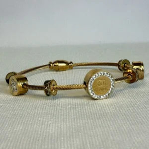 CC Gold bangle with stones