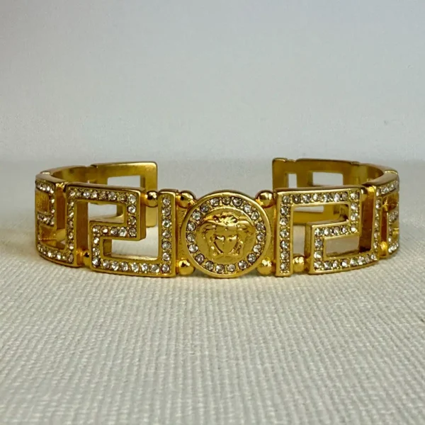 Motif gold bangle with diamanté stones